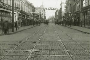 A photo circa 1890 looks east down Burnside Street toward the bridge, with Ericksons Cabaret Grill on the left.